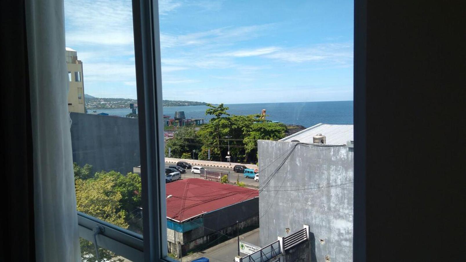 Green Eden Hotel Manado Oda fotoğraf